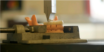 Mechanical Behaviors of a New Polymer-Based Restorative Material for Immediate Loading: An In Vitro Comparative Study