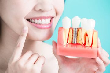 Ridge Augmentation and Delayed Extraction Implant in a Central Incisor: Proper Management of Hard and Soft Tissues to Achieve Ideal Aesthetics