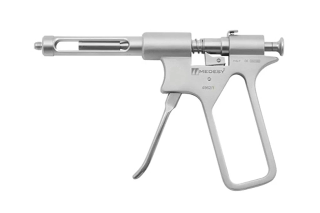 Jeringa anestésica intraligamentaria con empuñadura tipo pistola.