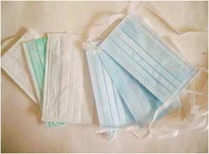 Máscara facial plissada em azul esmeralda, com alças para as orelhas, livre de látex, caixa com 50 máscaras. Devido