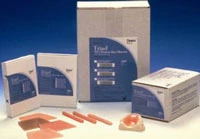 Material de rebase fibroso de flujo original Triad, curado con luz, duro, de color rosa claro.