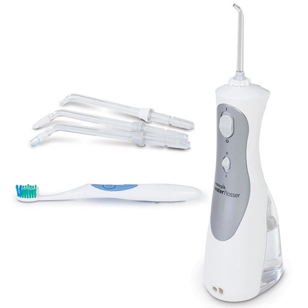 Профессиональный ирригатор Waterpik с щеткой. В комплекте: настенное зарядное устройство, 2 насадки.