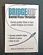 BridgeAid dental floss threader, package of 100 dispensing envelopes with 10